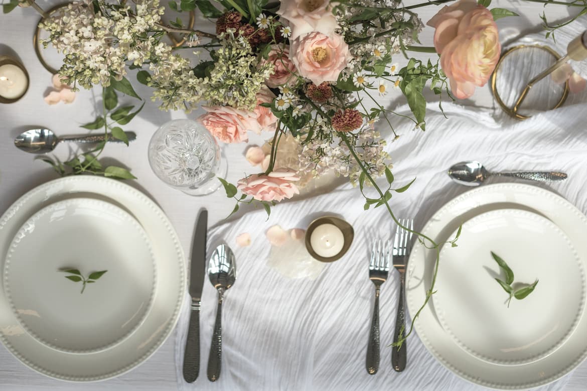a-dining-table-filled-with-floral-decoration.jpg